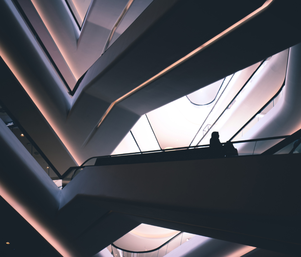 Report cover showing staircases in an office building of large company like Amazon.