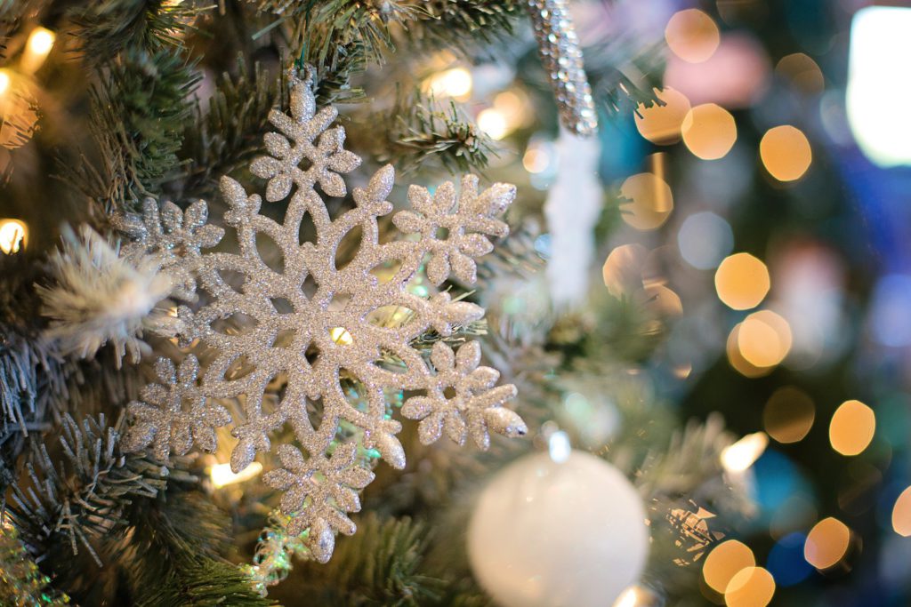 A snowflake hanged in Christmas tree